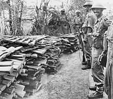 Troops of the 5th Indian Division guarding stockpiles of weapons handed in by surrendering Japanese forces in Singapore. British Reoccupation of Singapore, 1945 IND4807.jpg