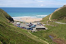 James grew up in Cornwall (pictured: Cornwall's Chapel Porth, seen on the cover and referenced in the liner notes of James's 1993 album Surfing on Sine Waves).[27]