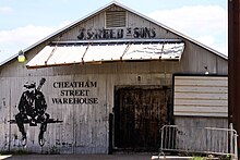 George Strait had his first performance at Cheatham Street Warehouse in San Marcos, Texas on October 13, 1975. Cheatham Street Warehouse West Entrance 2020.jpg