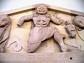 An archaic Gorgon (around 580 BC), as depicted on a pediment from the temple of Artemis in Corfu, on display at the Archaeological Museum of Corfu