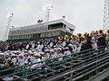 The marching band in the stands near the northwest corner of Rynearson Stadium