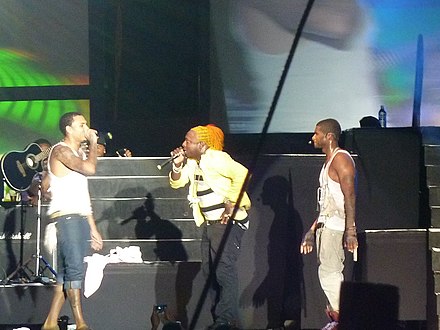 Brown with Usher and Elephant Man at the Reggae Sumfest in 2010
