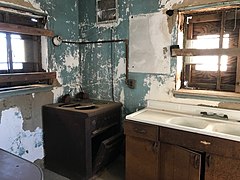 The kitchen inside the staff house[104]