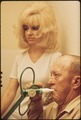 FORMER MACHINIST MR. WILBUR SHUFF USES A LUNG FUNCTION TESTING MACHINE TO MEASURE HIS BREATHING CAPACITY. HAVING... - NARA - 545486.tif
