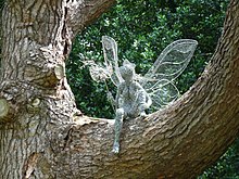 Fairy with dandelion Robin Wight sculpture Trentham Gardens.jpg