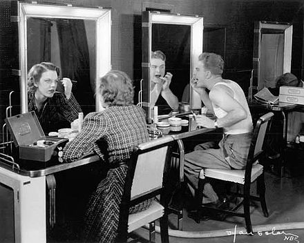 Albert and Grace Bradt applying makeup for their first TV appearance in November 1936