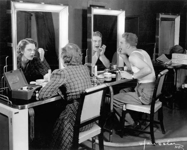 Albert and Grace Bradt applying makeup for their first TV appearance in November 1936