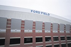 Ford Field allows natural light to penetrate through gray translucent roof panels.