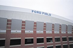 Ford Field allows natural light to penetrate through gray translucent roof panels.
