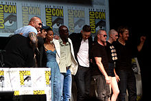 The cast and crew of Guardians of the Galaxy at the 2013 San Diego Comic-Con (L-R: producer Kevin Feige, Bautista, director James Gunn, del Toro, Saldana, Hounsou, Pace, Rooker, Gillan, and Pratt) Guardians of the Galaxy cast by Gage Skidmore.jpg