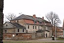 Manor complex, consisting of manor house (No. 36), farm building (No. 35), distillery (No. 43b) and park wall