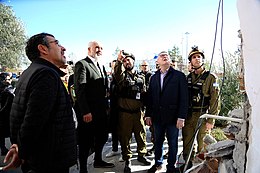 Rama surveying earthquake damage with an Israel Defense Forces Aid Mission in 2019