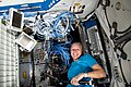 "ISS064E048595_-_Shannon_Walker_installing_Ethernet_cables_aboard_the_ISS.jpg" by User:Askeuhd