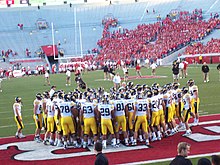 Huddle before Wisconsin game IowaHawkeyes2007AwayJersies.jpg