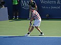 John Isner during his first round match of the 2018 Western and Southern Open against Sam Querrey.