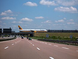 A taxiway crossing the Autobahn Leipzig-Halle Airport Condor.jpg