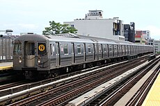 MTA NYC Subway N train arriving at 36th Ave.jpg