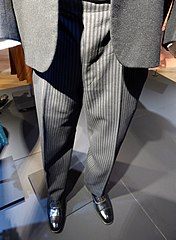 Formal trousers to a black lounge suit in an exhibition of the Textilfabrik Cromford, Ratingen, Germany.