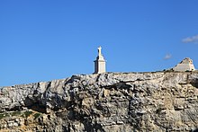 The statue of Saint Paul and the ruins of the tower.