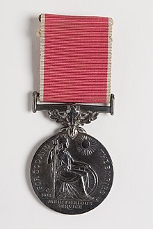 The insignia of the British Empire Medal in the civil division Medal, service (AM 2001.25.708-1).jpg