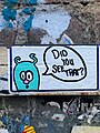 Monster saying "Did you see that?" graffiti tag on E Houston St, New York City