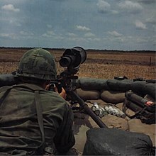 A machine gunner in Company "E", 2nd Battalion, 39th Infantry aims a .50-caliber machine gun at Dong Tam Base Camp, 20 April 1968 NARA photo 111-CCV-589-CC49158.jpg