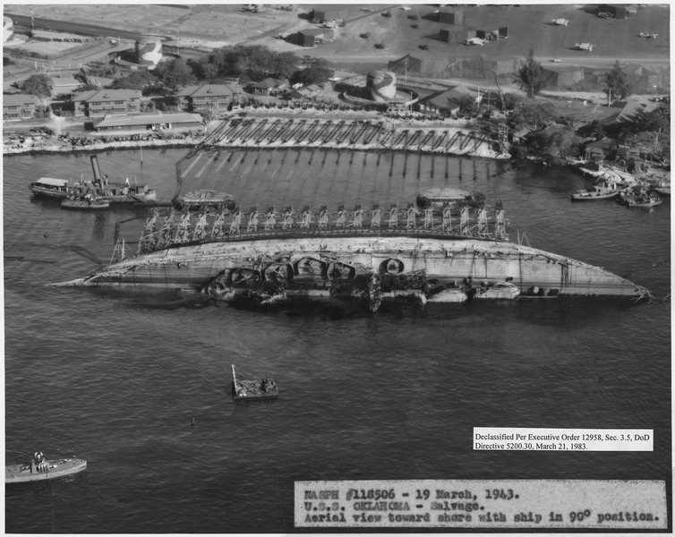 File:NASPH ^118506- 19 March 1943. USS Oklahoma- Salvage. Aerial viwe toward shore with ship in 90 degree position. - NARA - 296975.tif