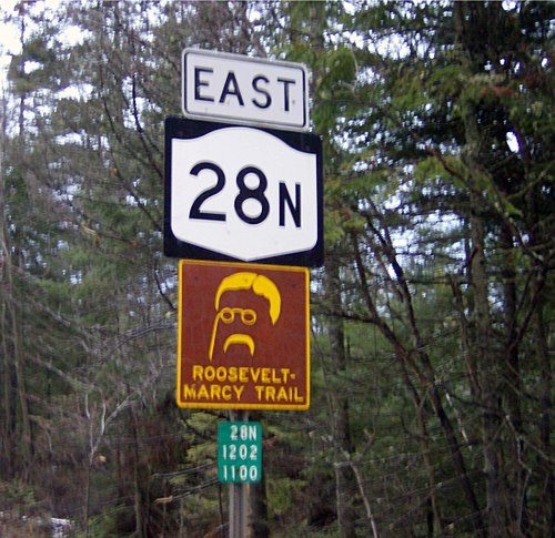 Sign for Route 28N with secondary sign for Roosevelt–Marcy Trail