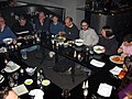 Attendees were crowded around a "move-protected" set of tables; the establishment's administrators had to be called in to add space. At its peak, there were more than 20 Wikipedians at the meetup at once.