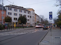 Wolkerova ulice v Olomouci s budovou KHS v místě, kde stával dům U dřevěného zvonu