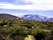 Oracle, Arizona is an unincorporated rural town often called a village in local media Oracle AZ Mt Lemmon.JPG
