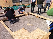 A WikiHouse under construction at Ouisharefest in Paris, May 2013 Ouisharefest - Wikihouse (8710423939).jpg