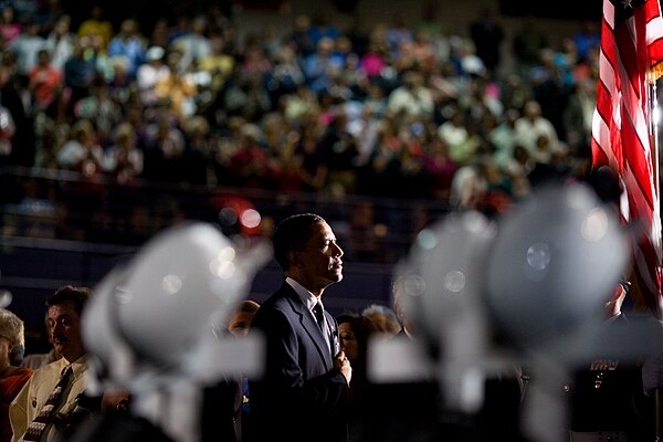 President Barack Obama stands for prayer on April 25, 2010, at the Beckley-Raleigh County Convention Center, while attending a memorial service for th
