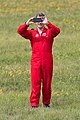 Pilots of the Red Arrows wear red flight suits.