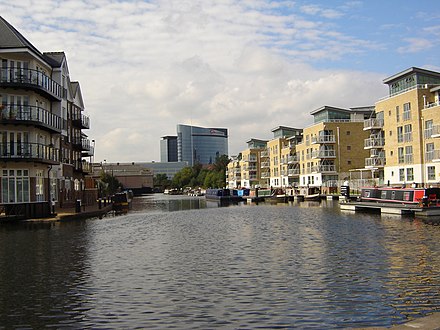 The Pool of Brentford Lock with new developments and the GSK building in background