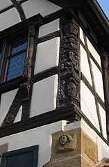 This corner post in a half-timbered (colombage) building is decoratively carved. Soultz-les-Bains, France.