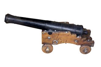 1/4the scale model of an 8-pounder short gun, 1786 pattern, with 1820 pattern mounting. On display at the Musee national de la Marine, Paris. Scale model of 8-pounder short gun-IMG 8890-white.jpg