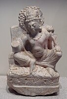 Seated Avalokiteshvara, white marble, Khair Khaneh, 6th-7th century CE. Musée Guimet MA 8151.[135]