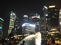 Singapore Merlion and skyscrapers in the background.JPG