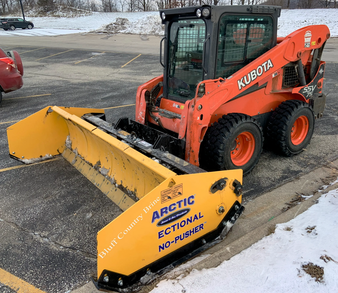 File:Snow pusher skid steer.webp