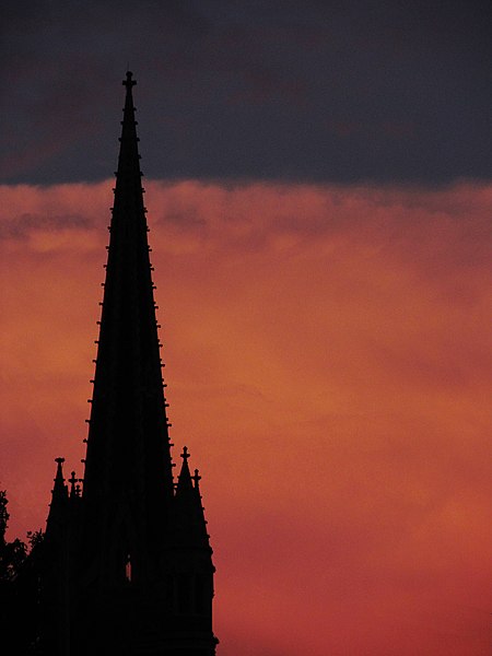 Storm clouds behind spire of Third Presbyterian