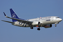 A TAROM Boeing 737-700 in SkyTeam special livery on short final to Brussels Airport in 2011. Tarom Boeing 737-700 YR-BGF BRU 2011-6-4.png