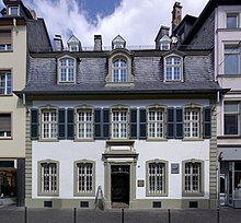 Marx's birthplace, now Bruckenstrasse 10, in Trier. The family occupied two rooms on the ground floor and three on the first floor. Purchased by the Social Democratic Party of Germany in 1928, it now houses a museum devoted to him. Trier BW 2014-06-21 11-11-49.jpg