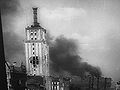 A screenshot from the WWII war movie chronicle made and shown during the Warsaw Uprising in the Palladium cinema. The film was made by and for the Propaganda and Information Bureau of the Home Army, and as such is PD. GFDL for my photo just in case