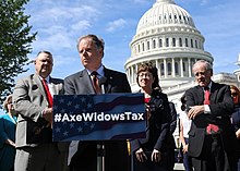 Jones speaking in support of eliminating the Widows Tax in 2019. Widows Tax press conference.jpg