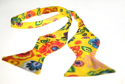 Bright Yellow patterned self-tie bow tie, made of cotton, designed and made in the UK