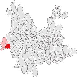 Territorio di Mangshi (rosso) nella provincia dello Yunnan