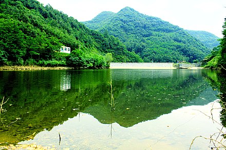 Lujiagou Reservoir, created by a dam visible in the background. The majority of Shiyan's electricity is derived from hydropower