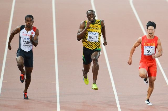 Su racing Usain Bolt and Jak Ali Harvey at the 2015 IAAF World Championships