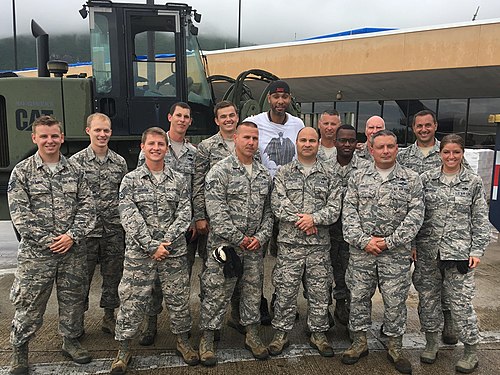 Duncan with members of the North Carolina Air National Guard at Cyril E. King Airport in 2017 after unloading 77,000 pounds of food donated by Duncan following Hurricane Irma and Hurricane Maria